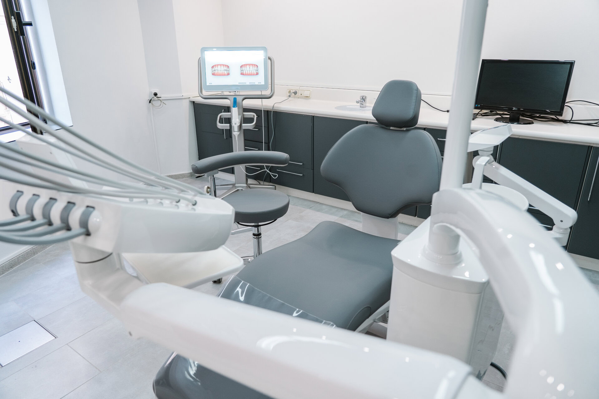 Treatment room with dental chair and equipment at Bell Creek Dentistry