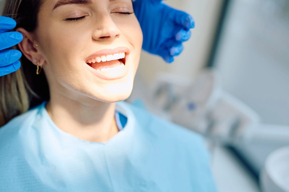 Patient reclined in the chair during a dental cleaning