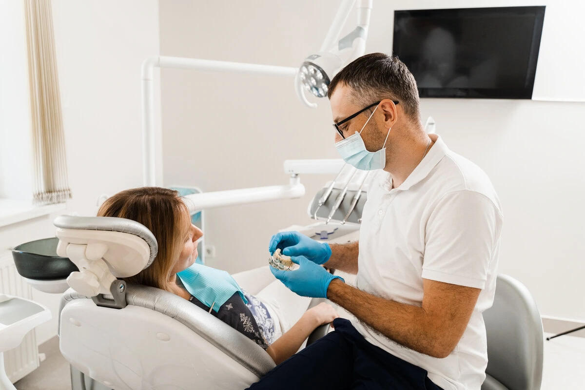 Patient reclined in the chair during an implant consultation
