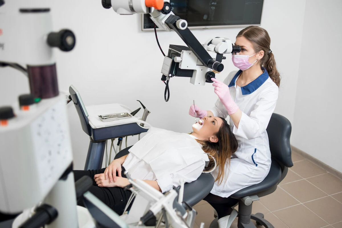 Patient resting in the dental chair before a procedure